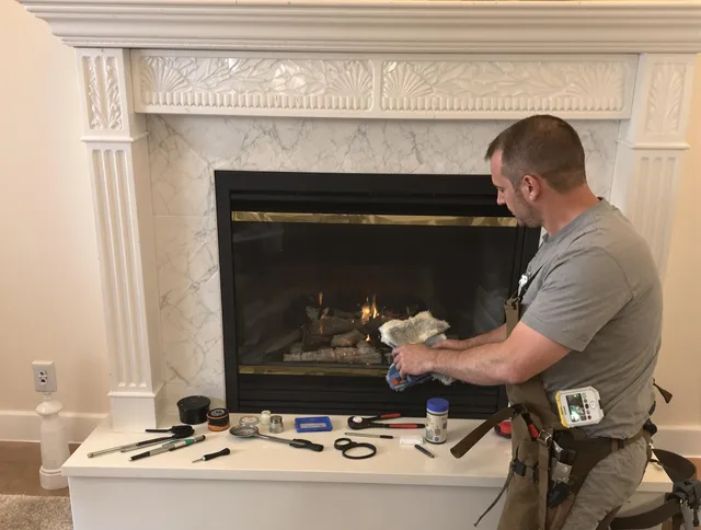 Gastonia Chimney Sweep performing fireplace maintenance in Gastonia, NC